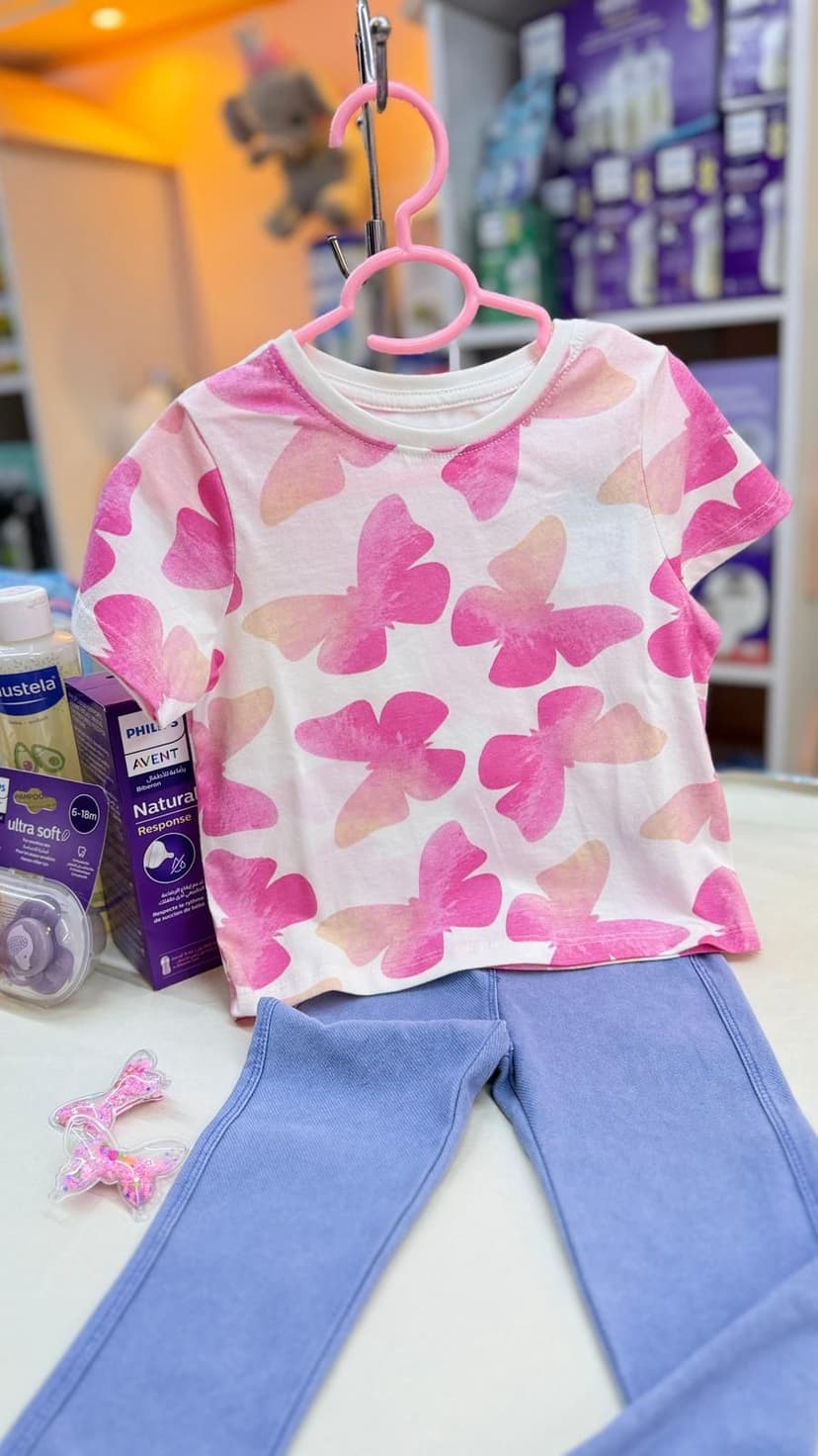 كنزة بيضا فراشات بينك 1-2سنين