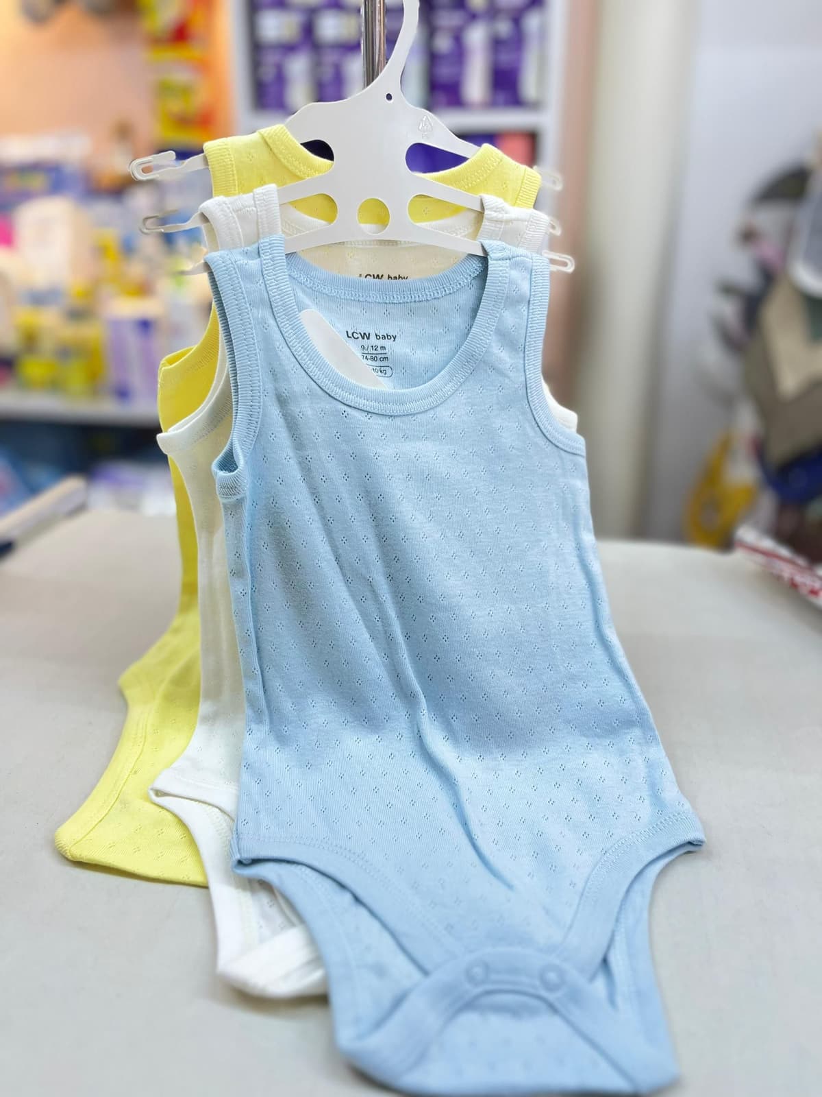 سيت بربتوزات سماوي ابيض اصفر3-6شهور