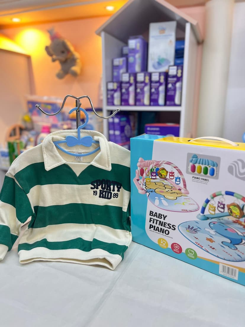 كنزة قطن خضرا مخططة ابيض 12-18شهر