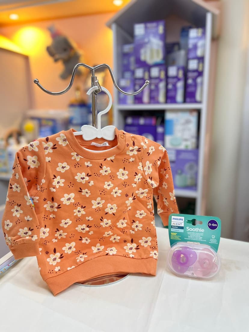 كنزة اورنج موردة 4سنين