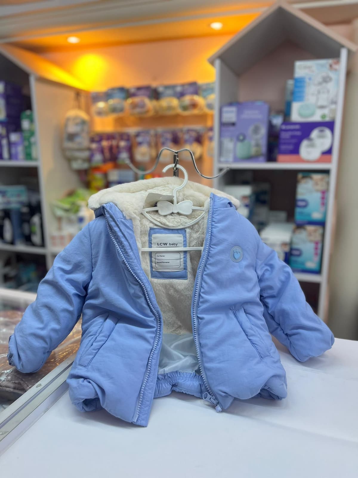 جاكيت بناتي وتر بروف سماوي 18-24شهر