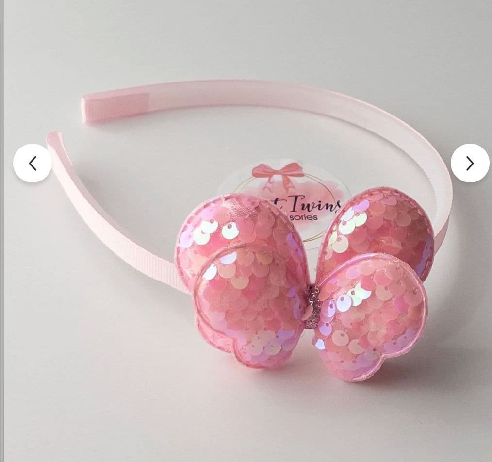 قوص بينك فراشة