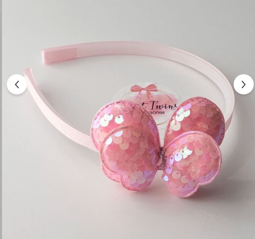 قوص بينك فراشة